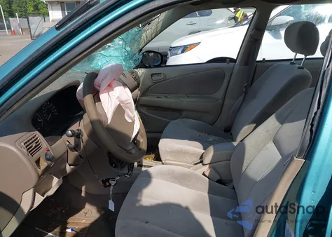 1999 Toyota Corolla Ce из США, поврежденный, VIN 2T1BR12E6XC134802